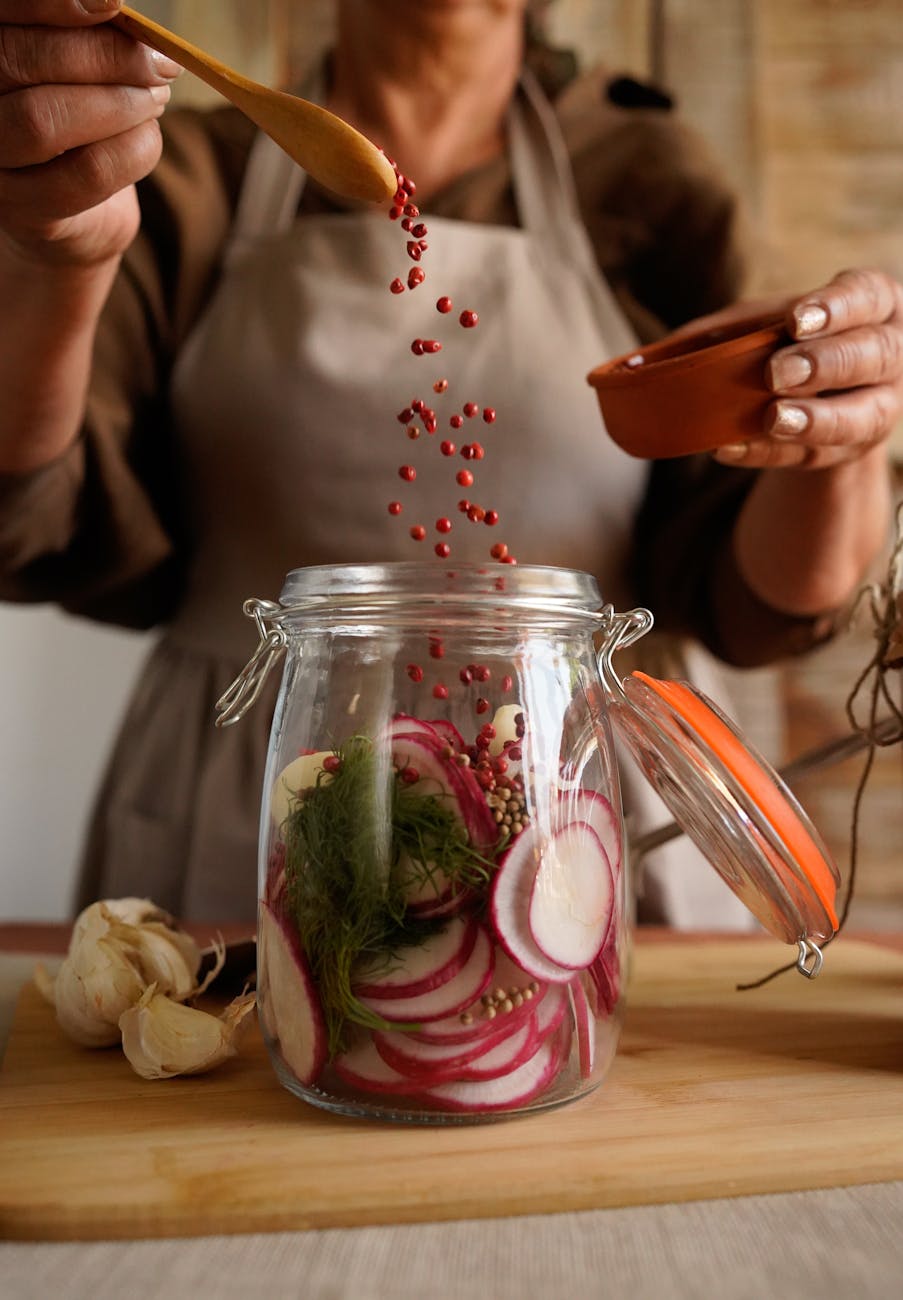 artisan pickling process with fresh radishes How to start Homesteading: Canning and Preserving