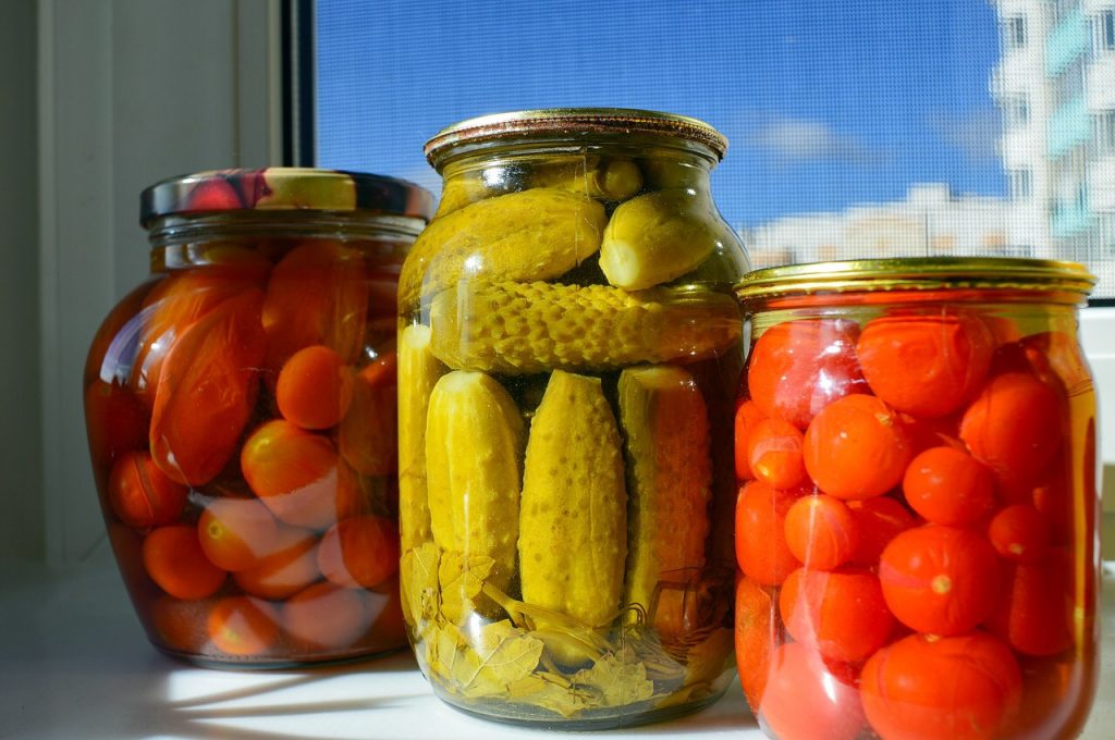 Canned Pickles and Tomatoes Planning a Survival Garden for Food and Medicine