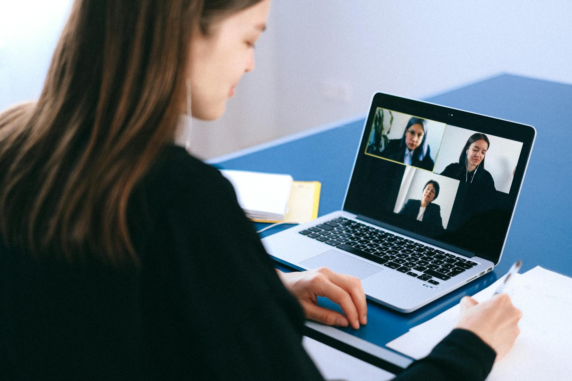 people on a video call Upgrade Your Zoom Meetings with an Eye-Catching Virtual Background
