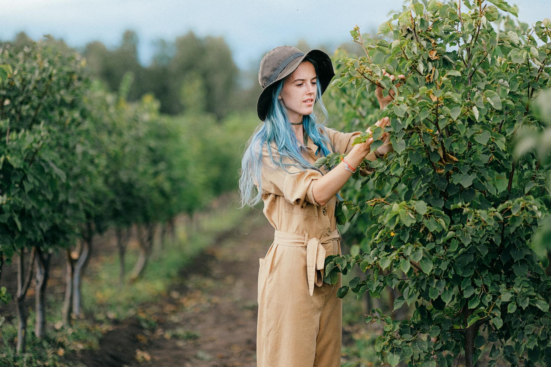 a woman touching leaves