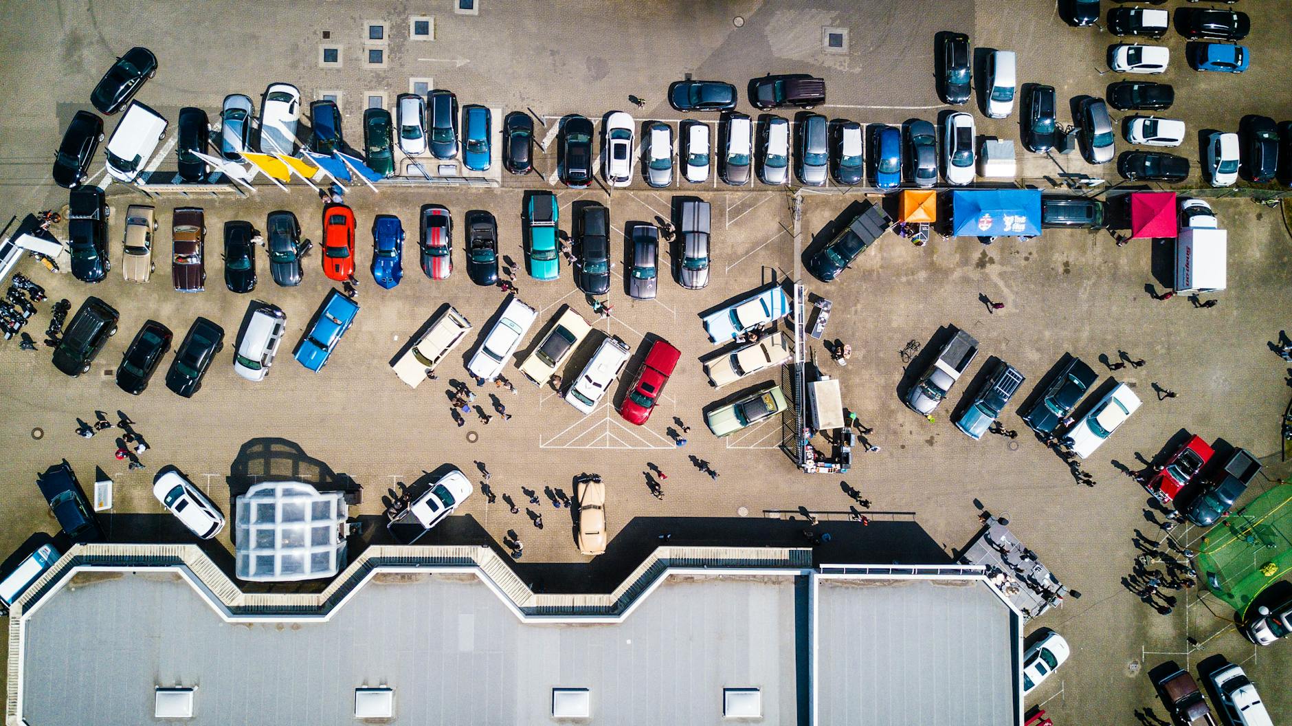 Should You Invest in a Commercial Property or Rent? 9 high angle photo of vehicles parked near building Should you invest in a commercial property or rent?