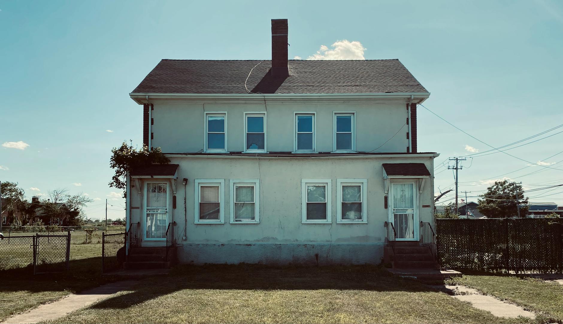 facade of a house Profitable Real Estate Investment Strategies: Tools, Tech, and Resources