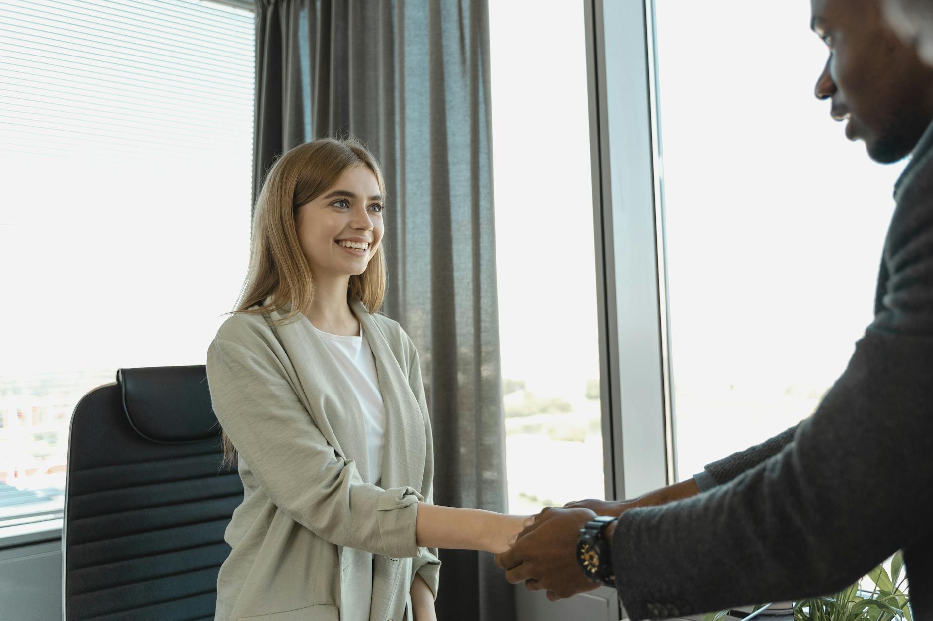 5 Key Questions To Ask Before Embarking On A New Career 10 female candidate doing hand shakes 5 Key Questions To Ask Before Embarking On A New Career