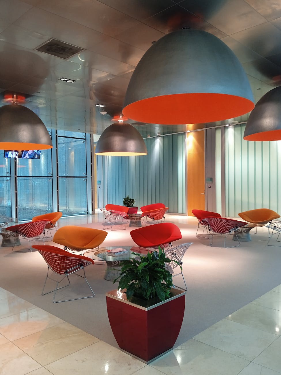 modern lamps over chairs How to Modernize Your Dental Practice in 2025: Tech, Decor, & Marketing Tips