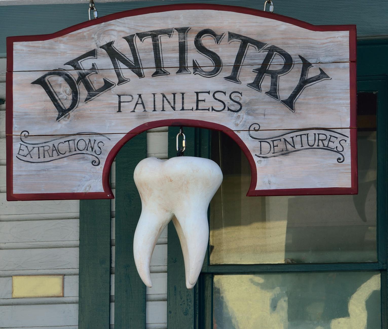 dentistry painless signage How to Modernize Your Dental Practice in 2025: Tech, Decor, & Marketing Tips