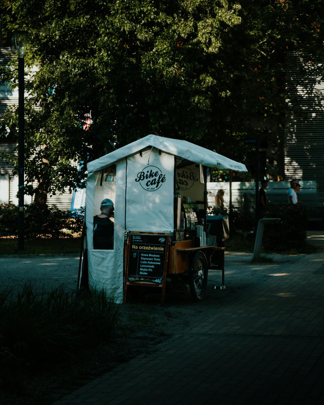 a small food cart parked on the sidewalk 3 Reasons to Start a Coffee Cart