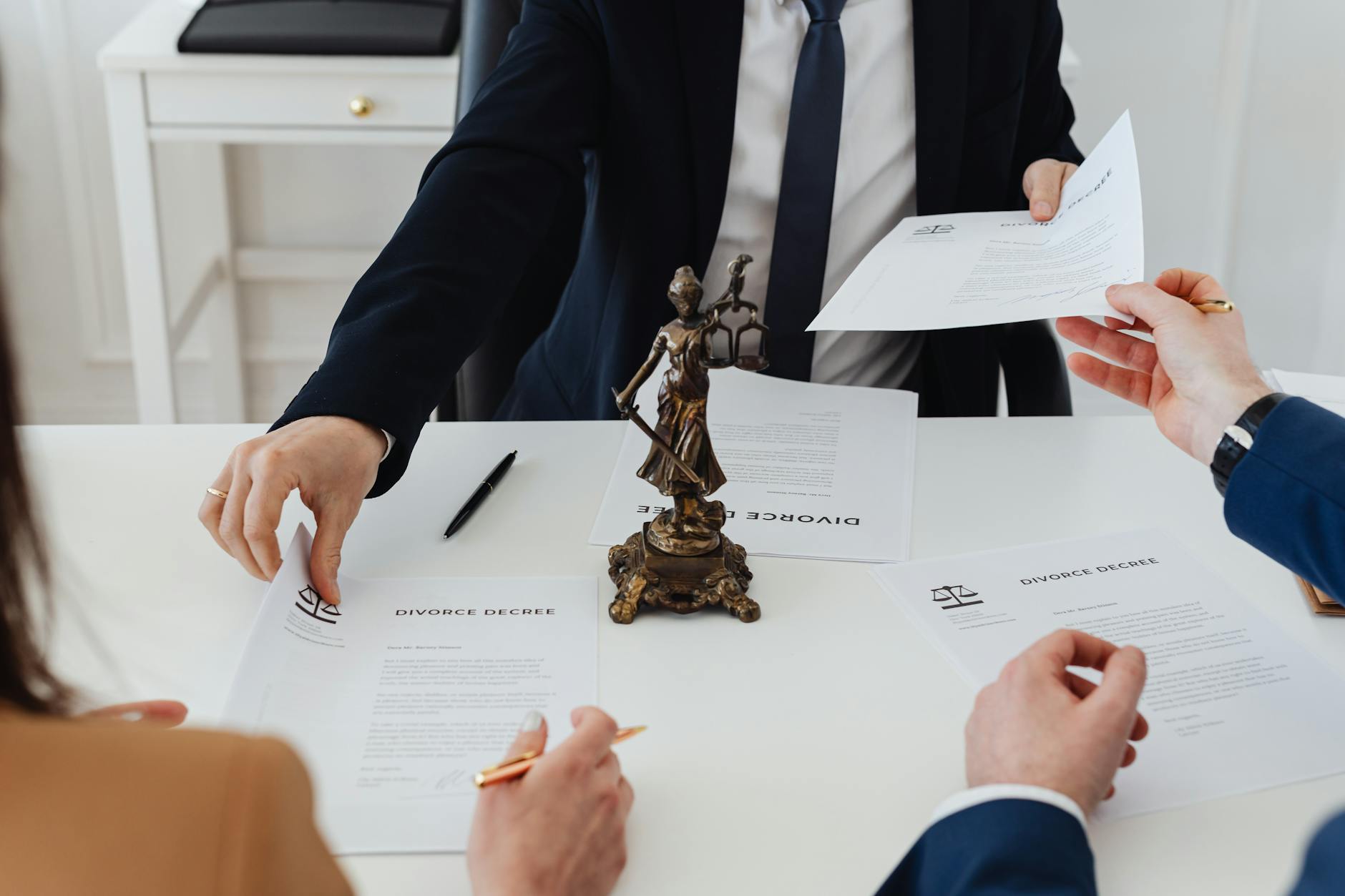 When to Hire an Attorney: Legal Guidance for Life’s Unexpected Moments 10 people holding divorce papers When to Hire an Attorney: Legal Guidance for Life’s Unexpected Moments