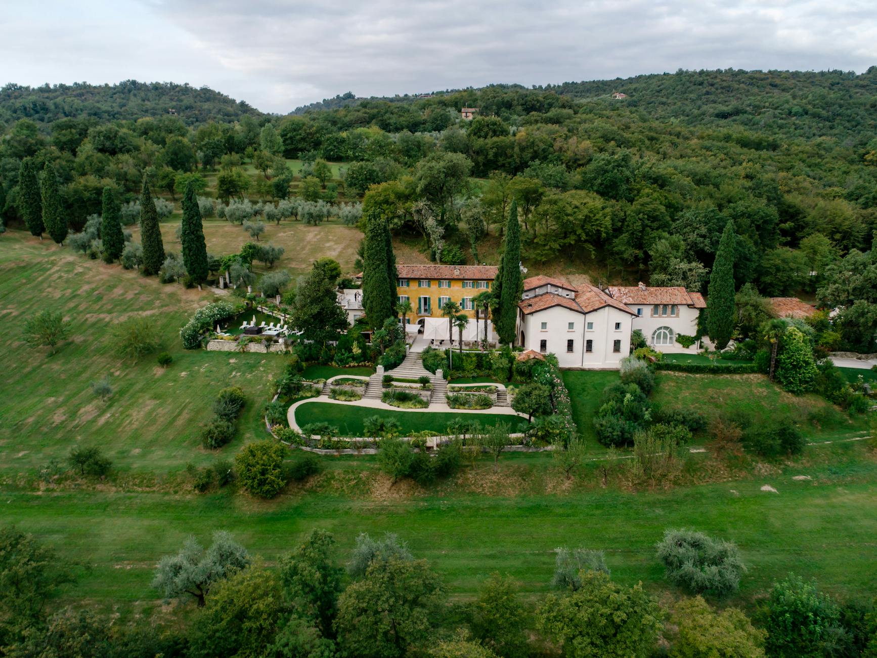 aerial view of a concrete building near the trees Buying a Home Overseas? Practical Tips for a Smart Purchase