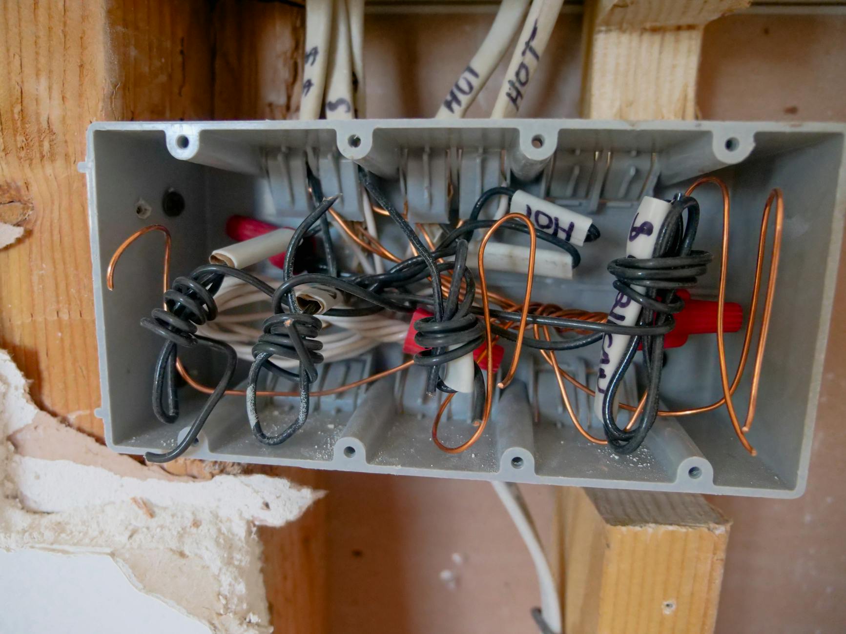close up photo of opened switchboard Home Fixes You'll Want To Hire A Pro For