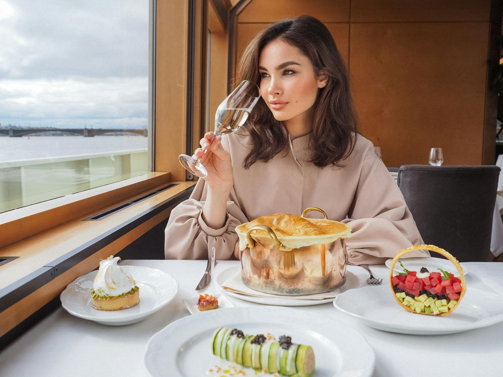 beautiful woman eating a meal on a cruise