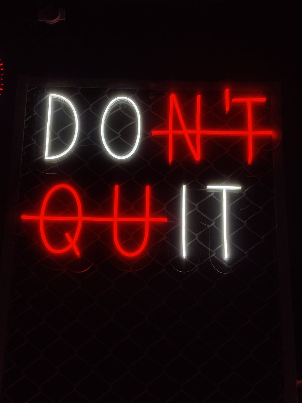 a neon sign that says don t quit The Power of the Exit: Learning to Leave What’s No Longer for You