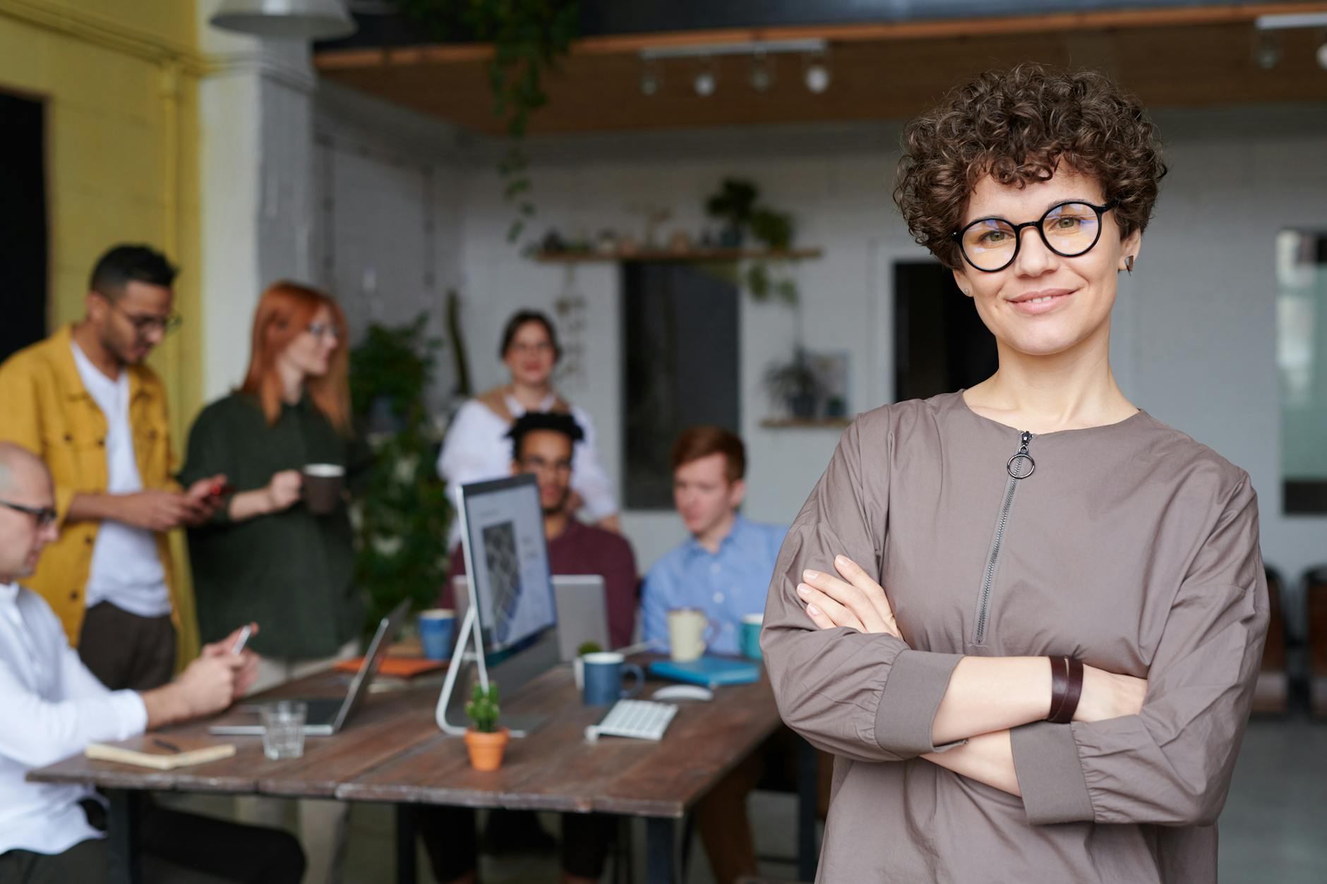 photo of woman wearing eyeglasses 4 Top Traits Of Exceptional Business Leaders
