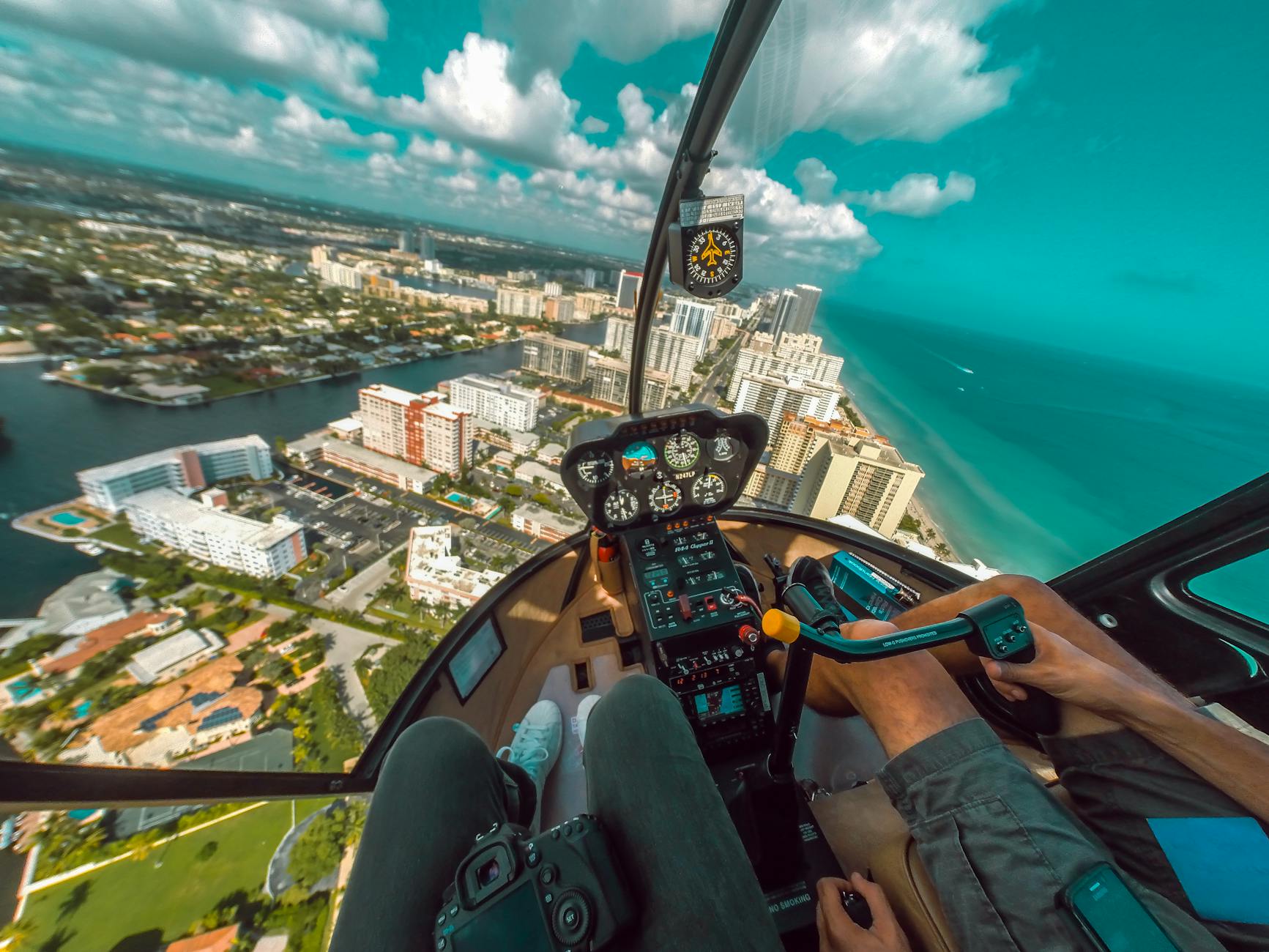 point of view of a person riding a helicopter Luxurious Travel Activities to Add to Your Bucket List