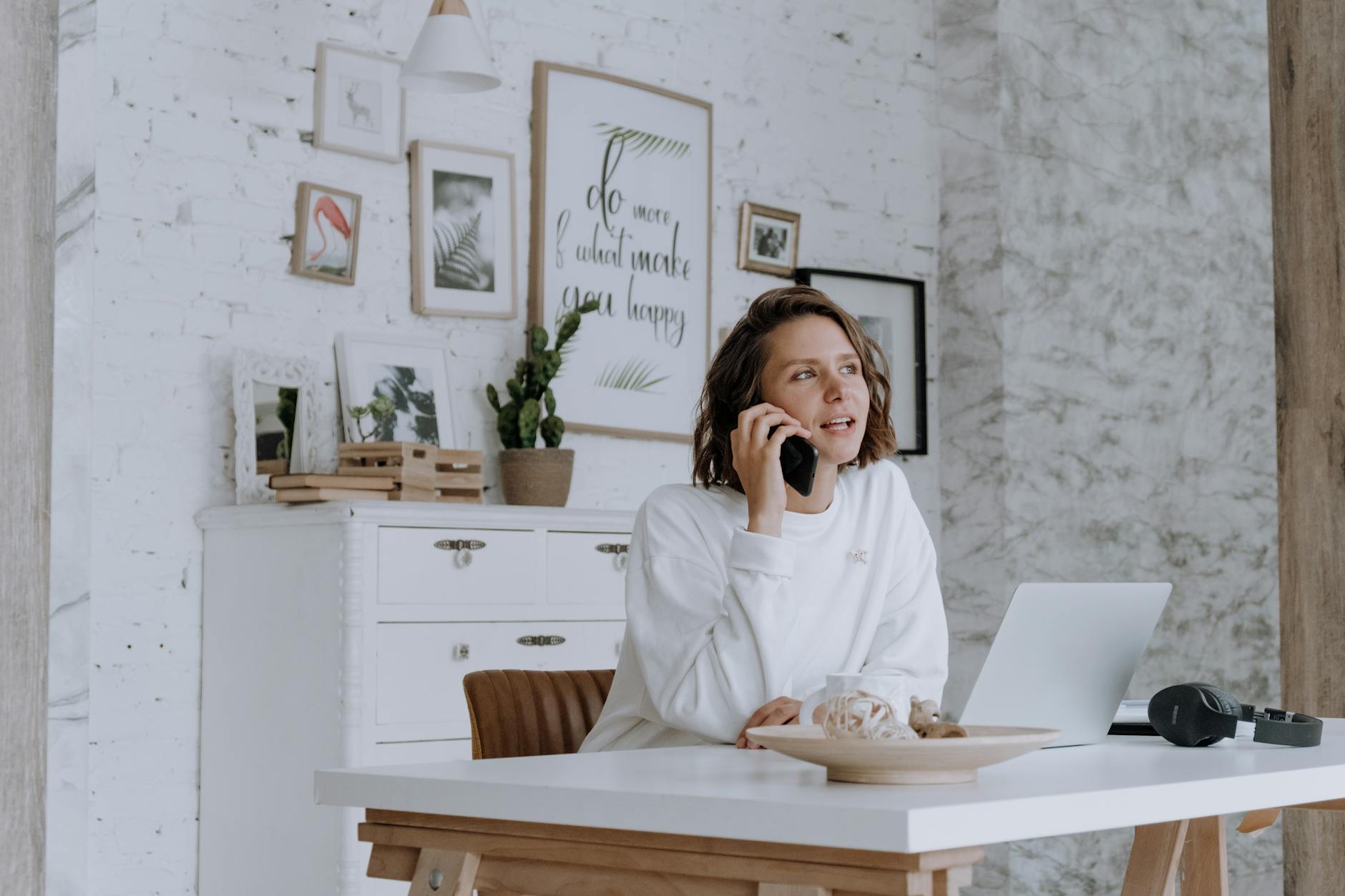 woman in white robe sitting on brown wooden chair Signs You Should Become Self-Employed