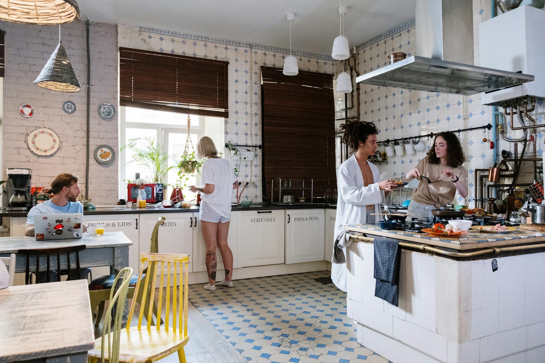 Budgeting for Shared Living: What to Expect and How to Split Costs 12 women and men in kitchen Budgeting for Shared Living: What to Expect and How to Split Costs