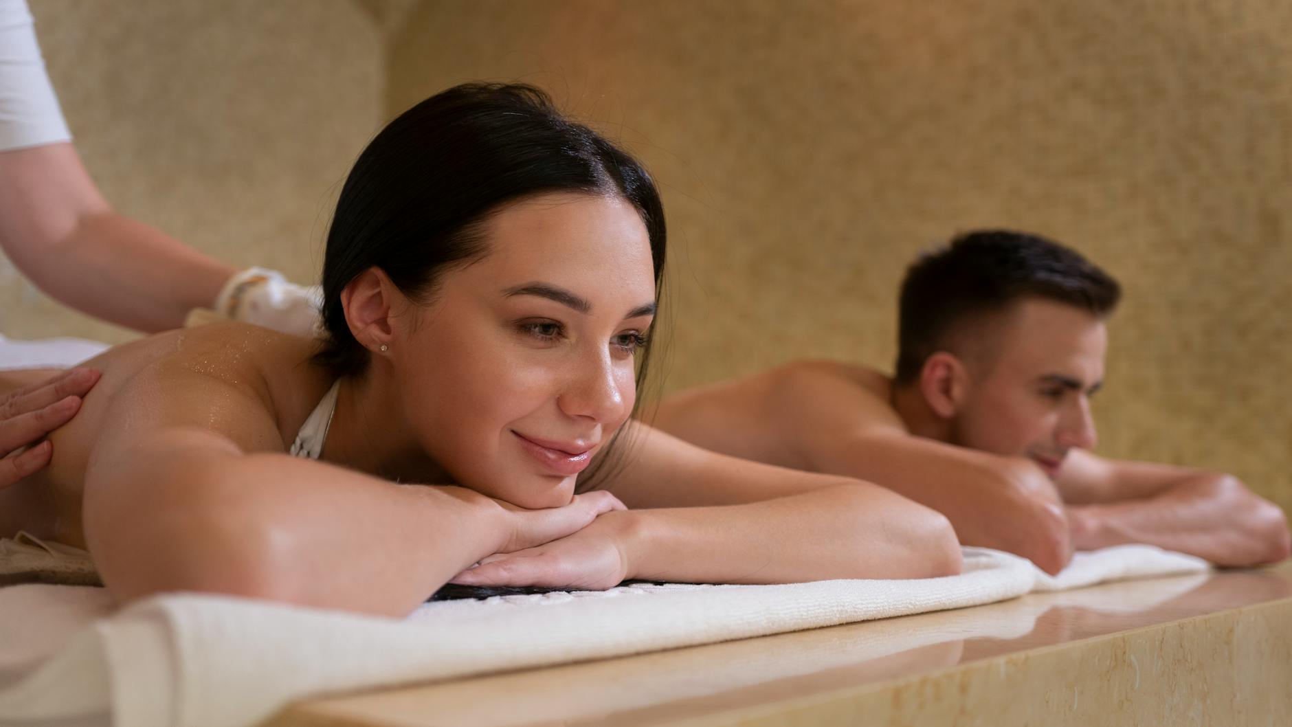 a couple receiving a massage 3 Romantic Vacation Ideas for Couples