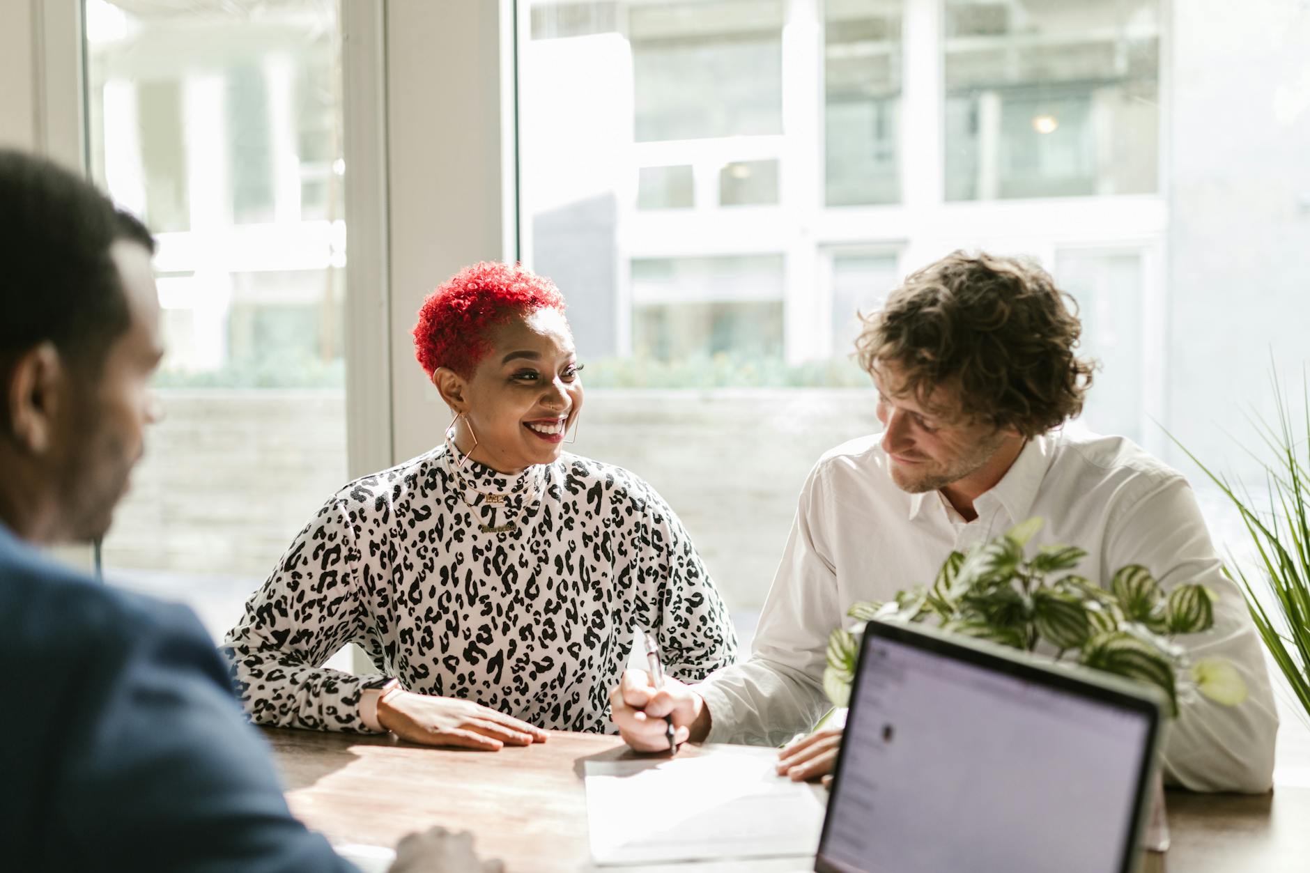 man in black and white long sleeve shirt sitting beside woman in white long sleeve shirt 3 Stressful Life Situations When You Need a Lawyer (and Why It Pays Off)
