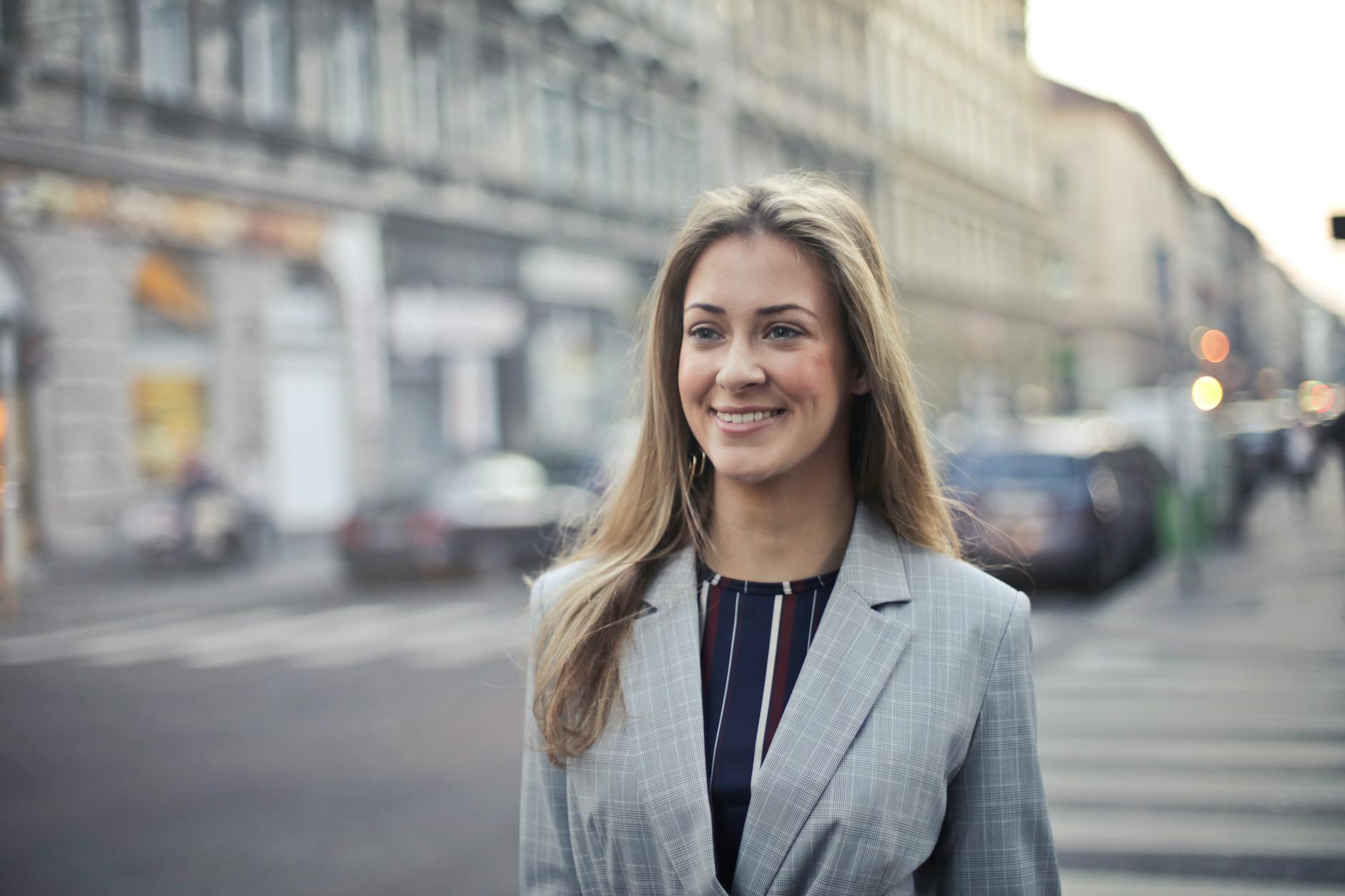 close up photography of a woman wearing formal coat Signs You Should Become Self-Employed