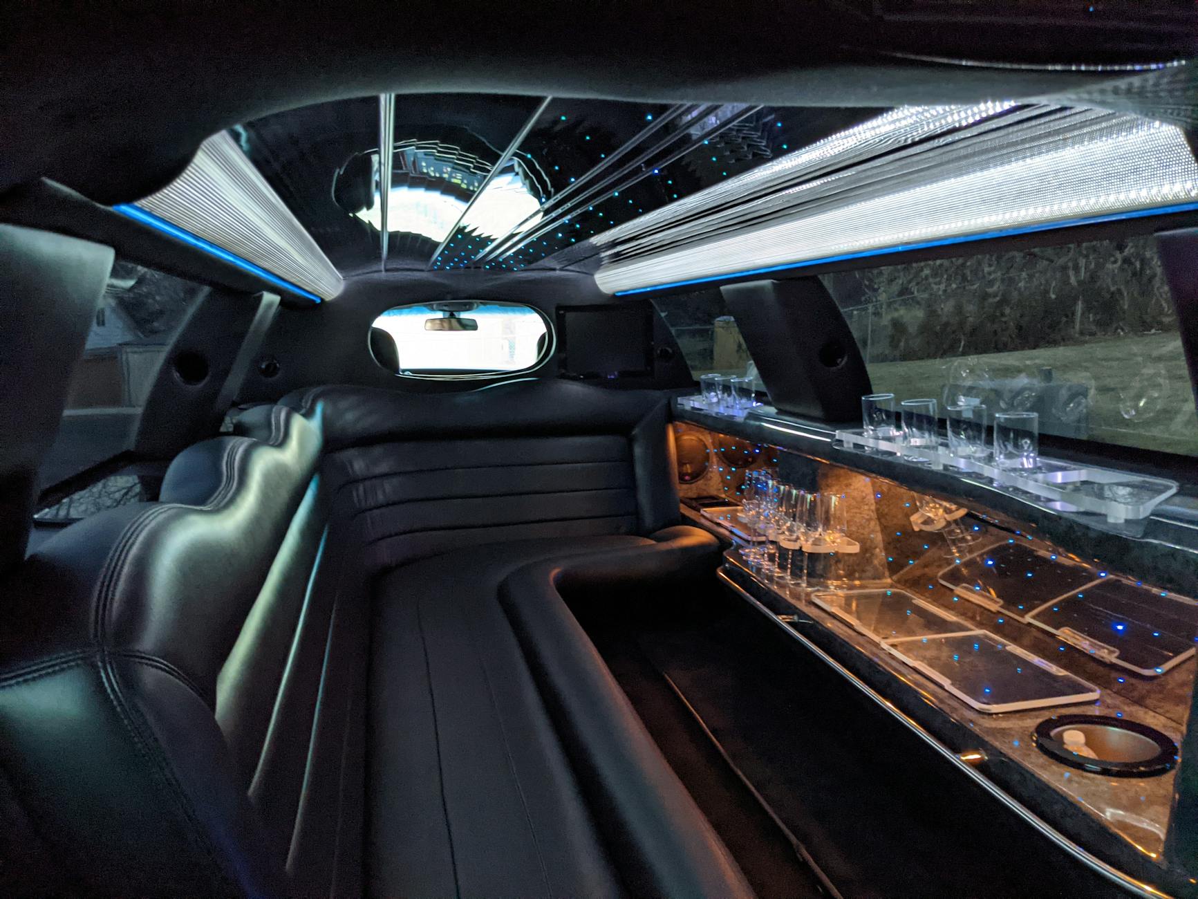 6 Ways to Add Luxury to Your Next Vacation 12 black limousine interior Add Luxury to Your Next Vacation