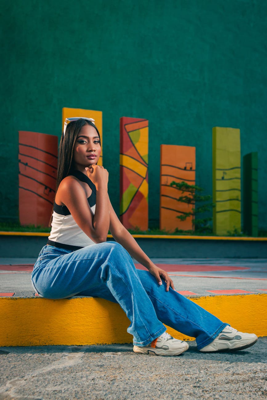 woman sitting on the sidewalk Things to Consider Before Sending Money to Venezuela