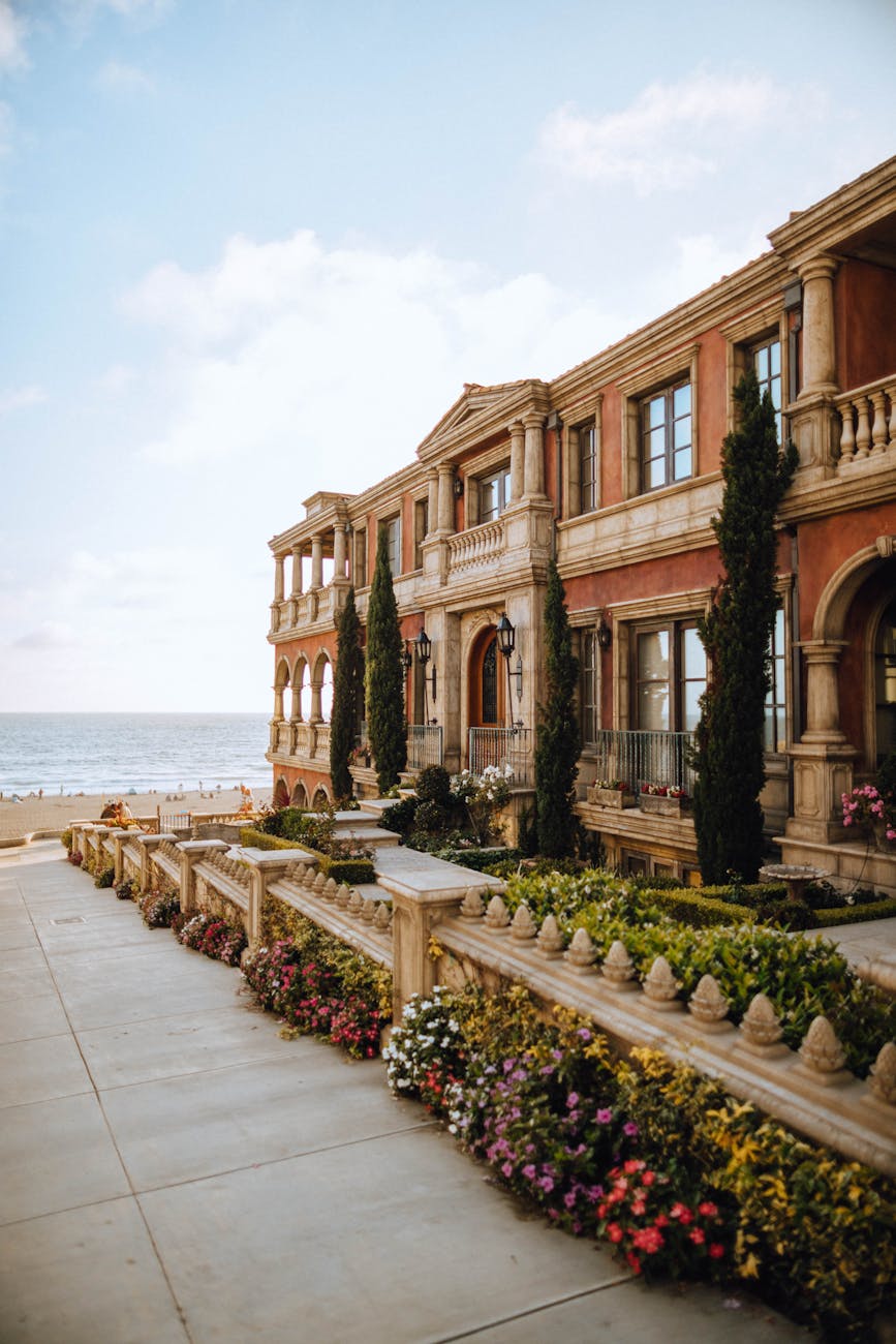 What Makes a Market “Elite”: High-End Vacation Rental Investment Hubs 10 brown building near body of water What Makes a Market “Elite”: High-End Vacation Rental Investment Hubs