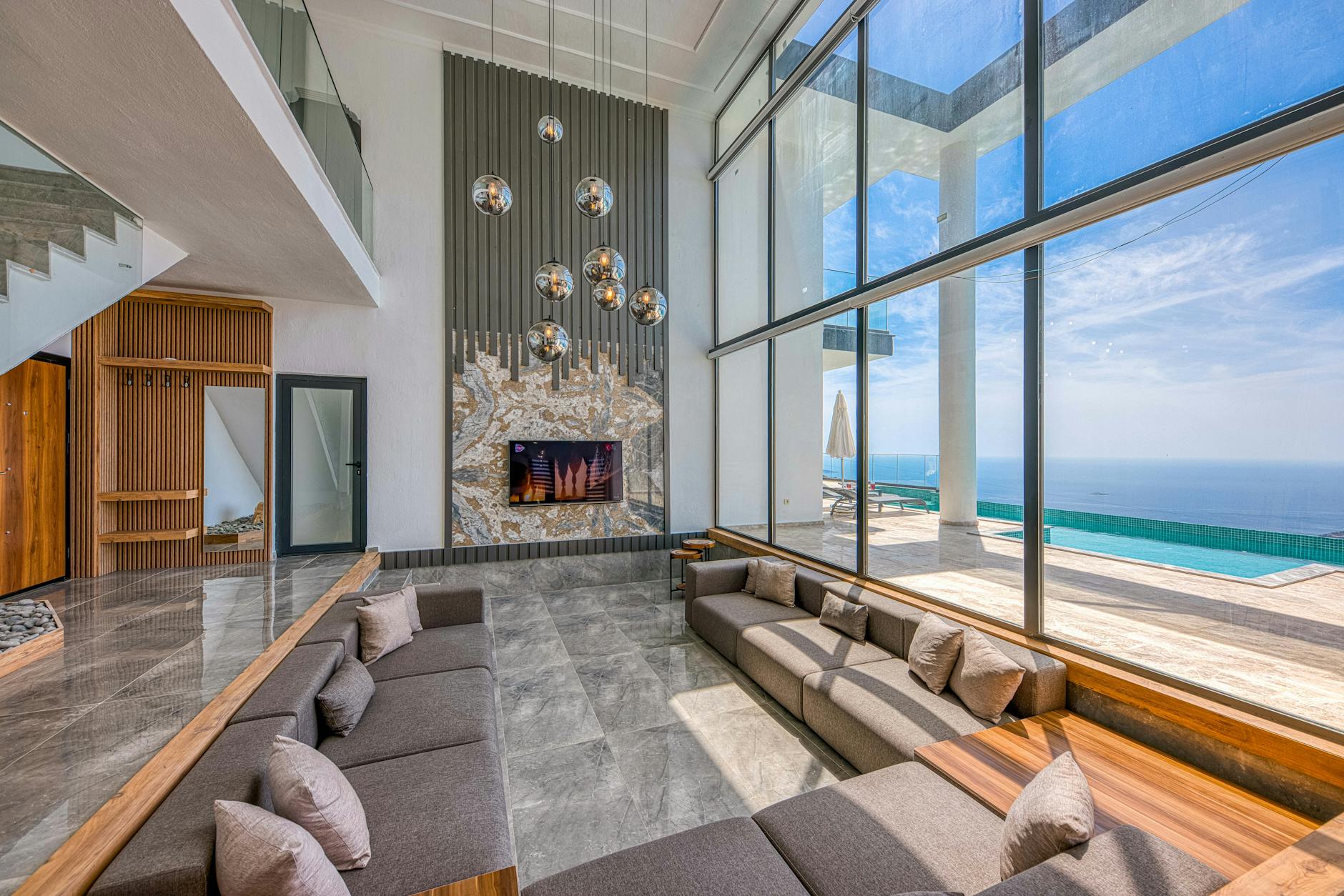 What Makes a Market “Elite”: High-End Vacation Rental Investment Hubs 12 luxury seaside villa with modern interior design What Makes a Market “Elite”: High-End Vacation Rental Investment Hubs