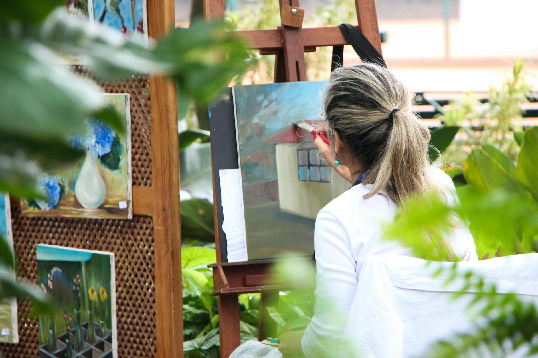 How To Rediscover Joy In Your Life 10 woman painting outside garden How To Rediscover Joy In Your Life