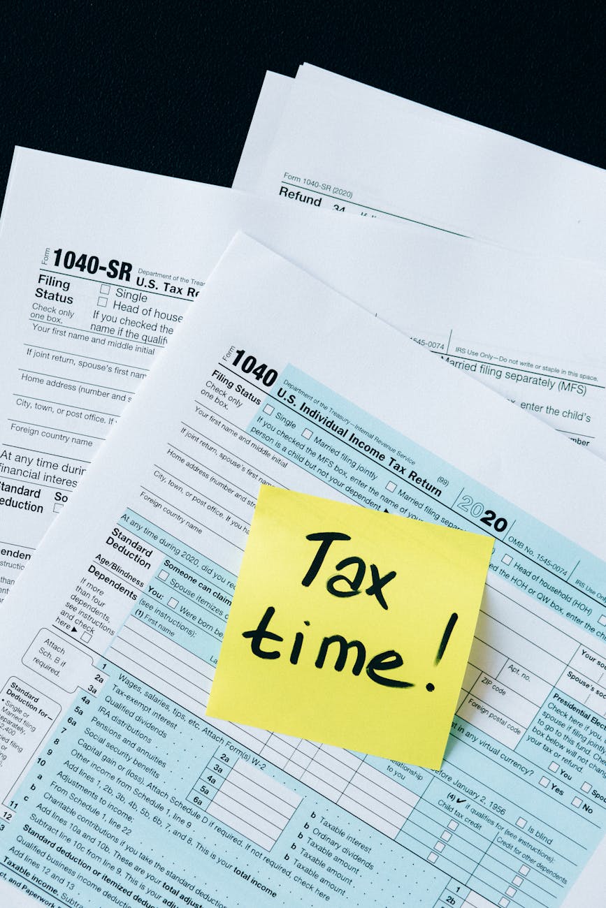 tax documents on the table Avoid These Legal Compliance Dangers When Starting Your Business