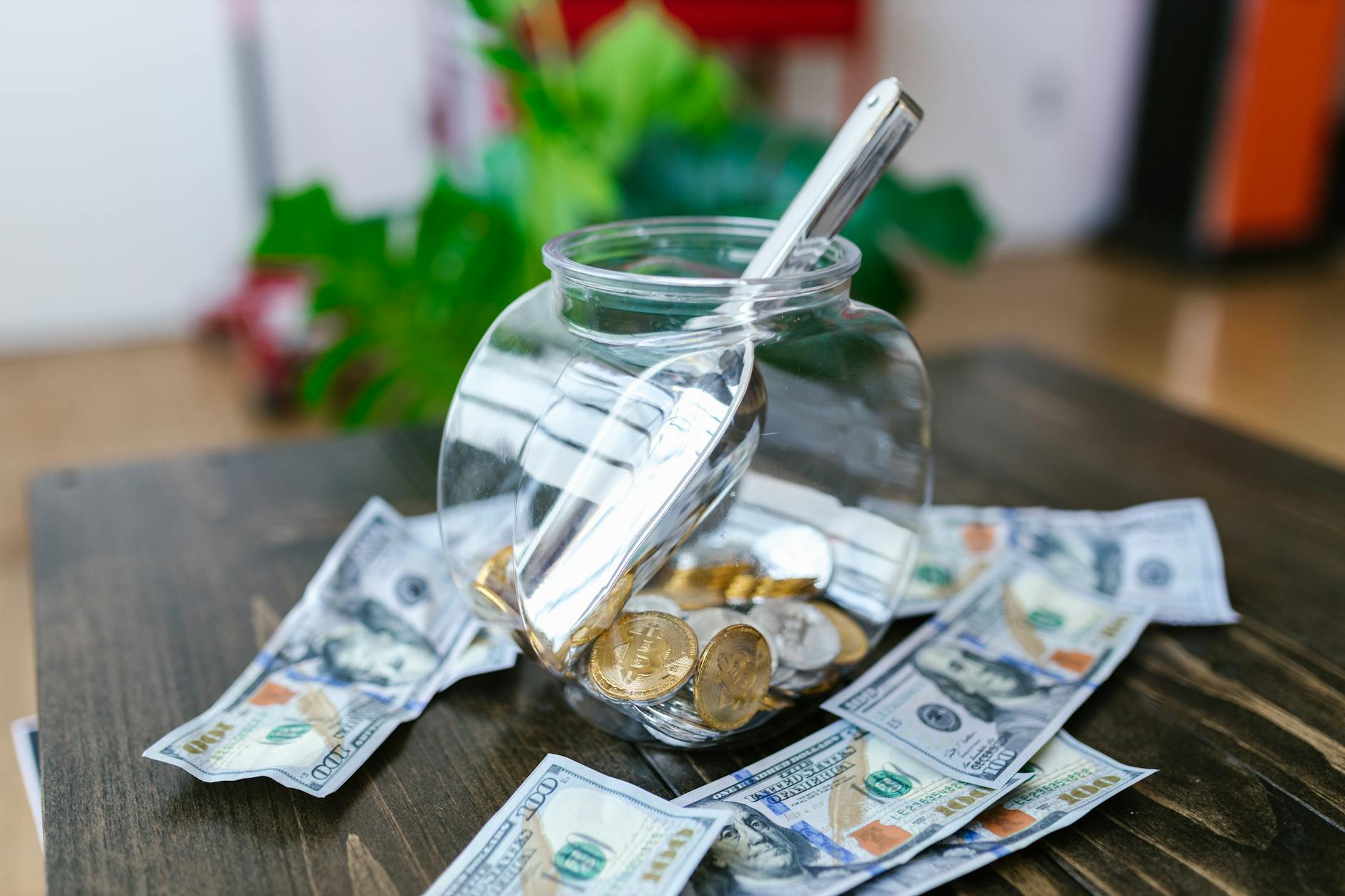 The Importance of a Small Business Emergency Fund 9 glass container with stainless scooper surrounded with paper bills The Importance of a Small Business Emergency Fund