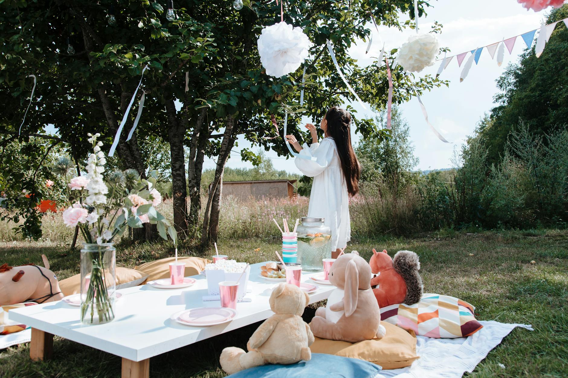 a girl in white dress at a picnic party How to Create a Kid-Friendly Home Without Sacrificing Style