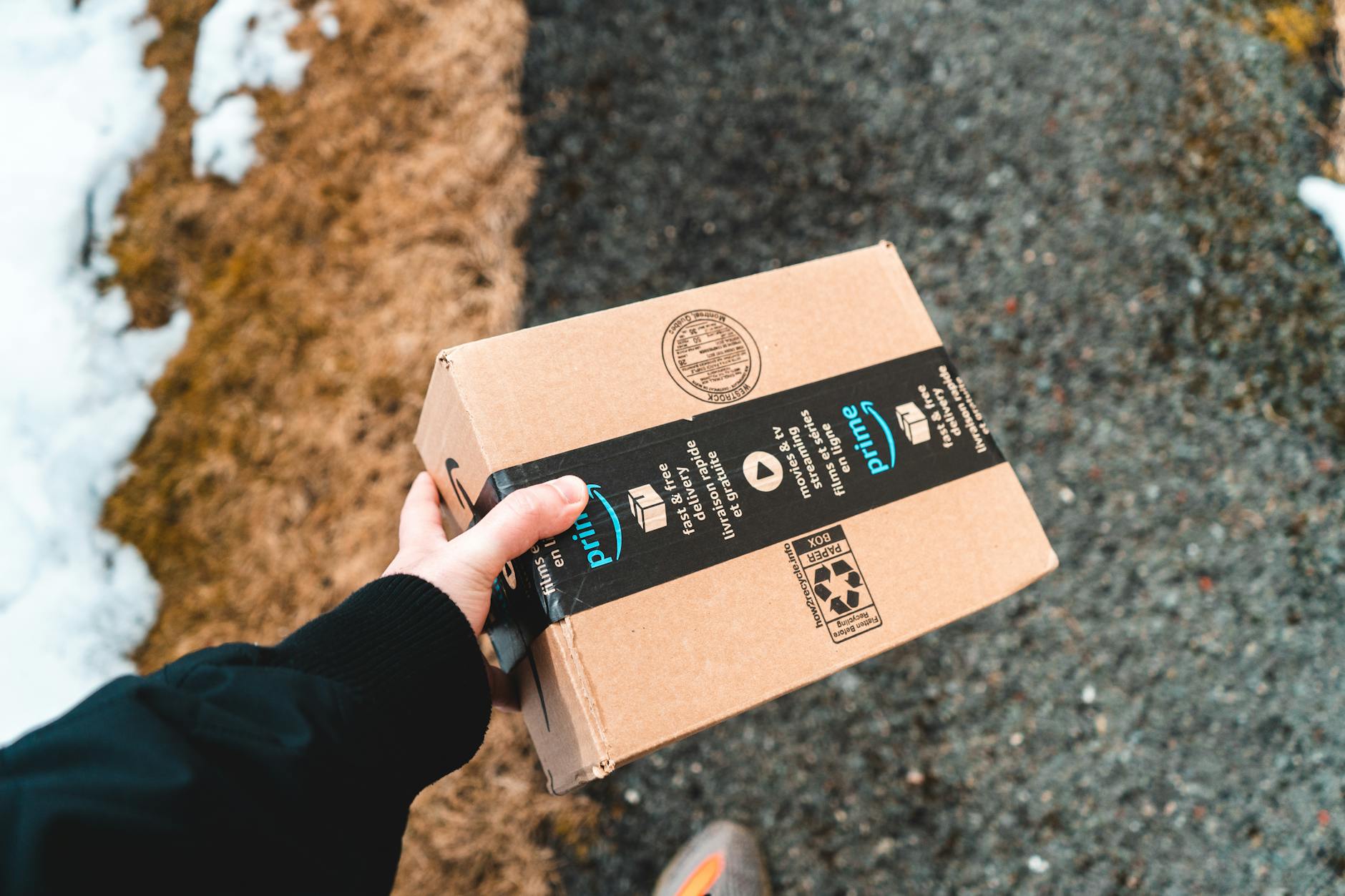 What Top Amazon Sellers Do Differently to Dominate the Marketplace 9 package from amazon prime carried by the delivery man What Top Amazon Sellers Do Differently to Dominate the Marketplace