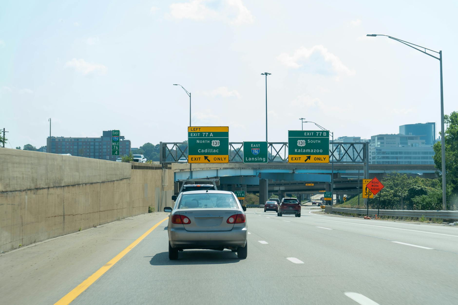 bustling highway overpass in grand rapids michigan Moving to Michigan: Migration Trends and Top Destinations