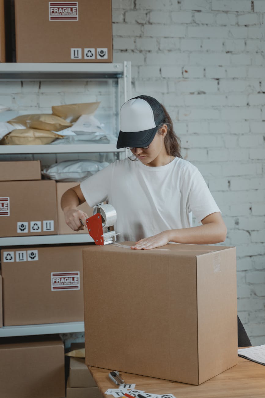 woman in white crew neck t shirt holding white and red ceramic mug Why Packaging Design Is Part of Customer Service Levels (And How to Get It Right)