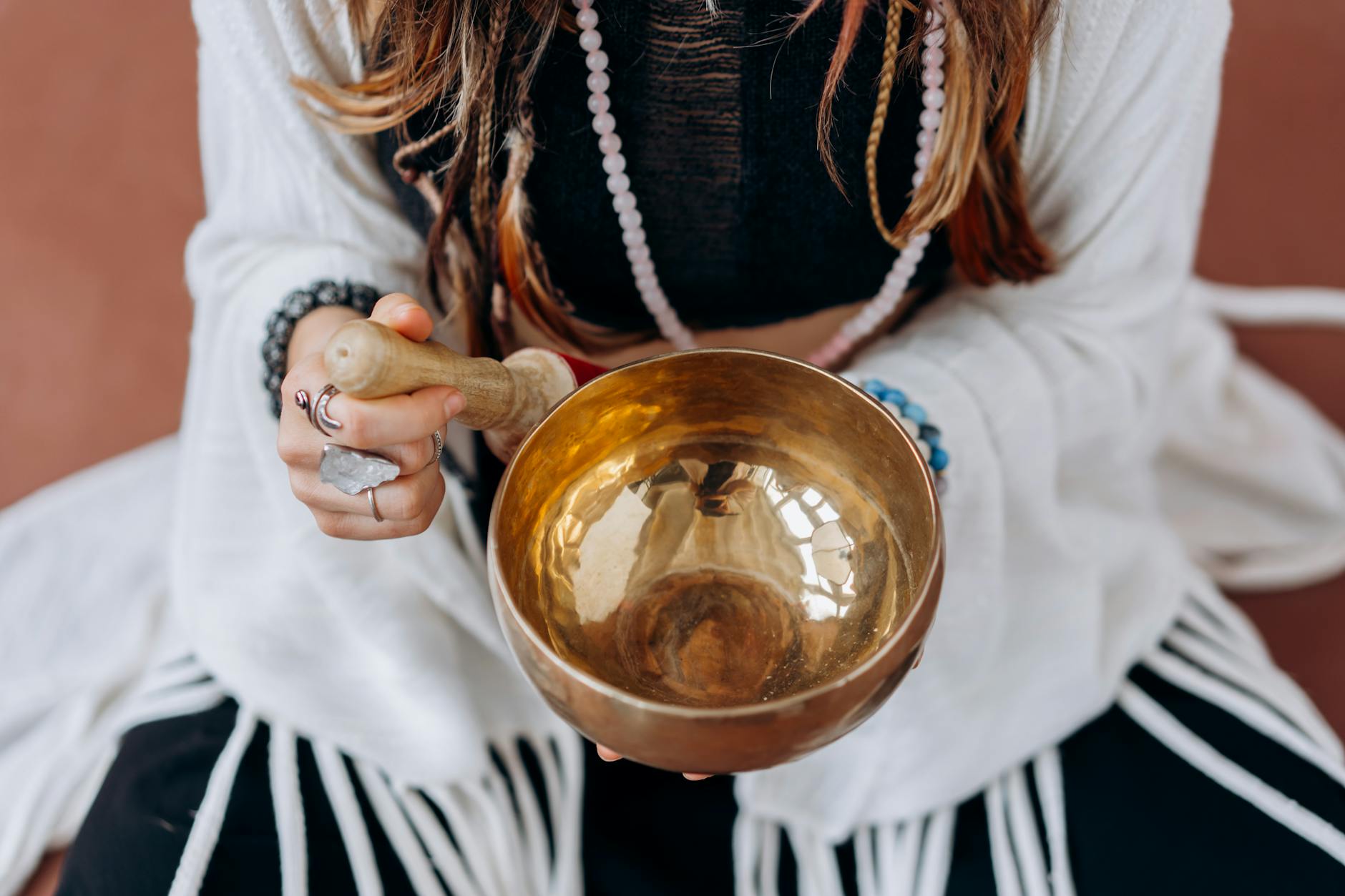How To Develop Resilient Mental Health 10 woman in white long sleeve shirt holding gold round bowl How To Develop Resilient Mental Health
