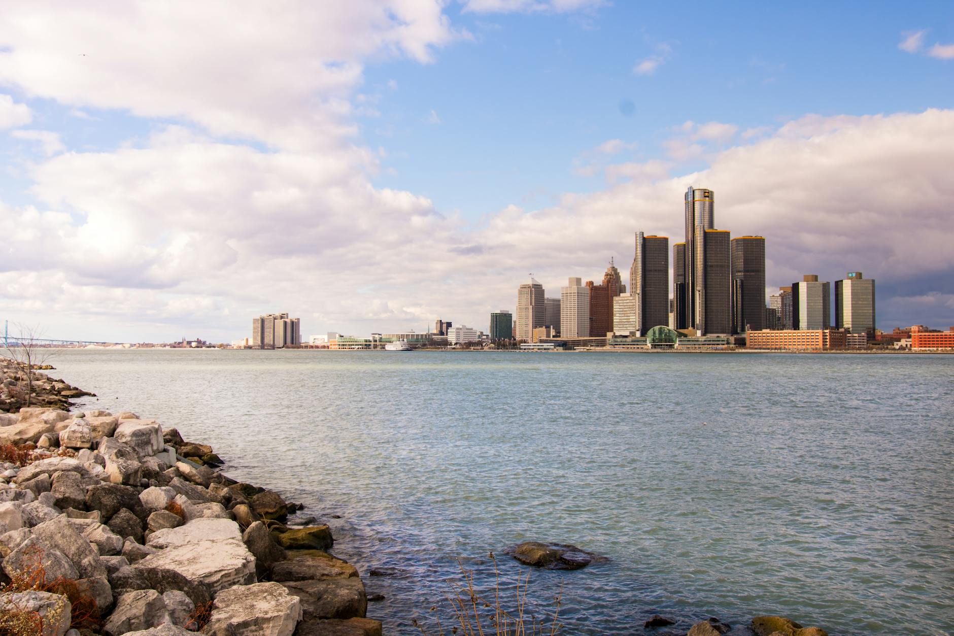 wide angle photography of city near body of water Moving to Michigan: Migration Trends and Top Destinations