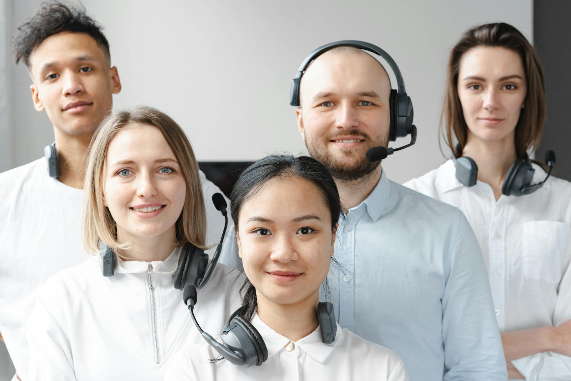 What Top Amazon Sellers Do Differently to Dominate the Marketplace 14 smiling call center agents looking at camera What Top Amazon Sellers Do Differently to Dominate the Marketplace