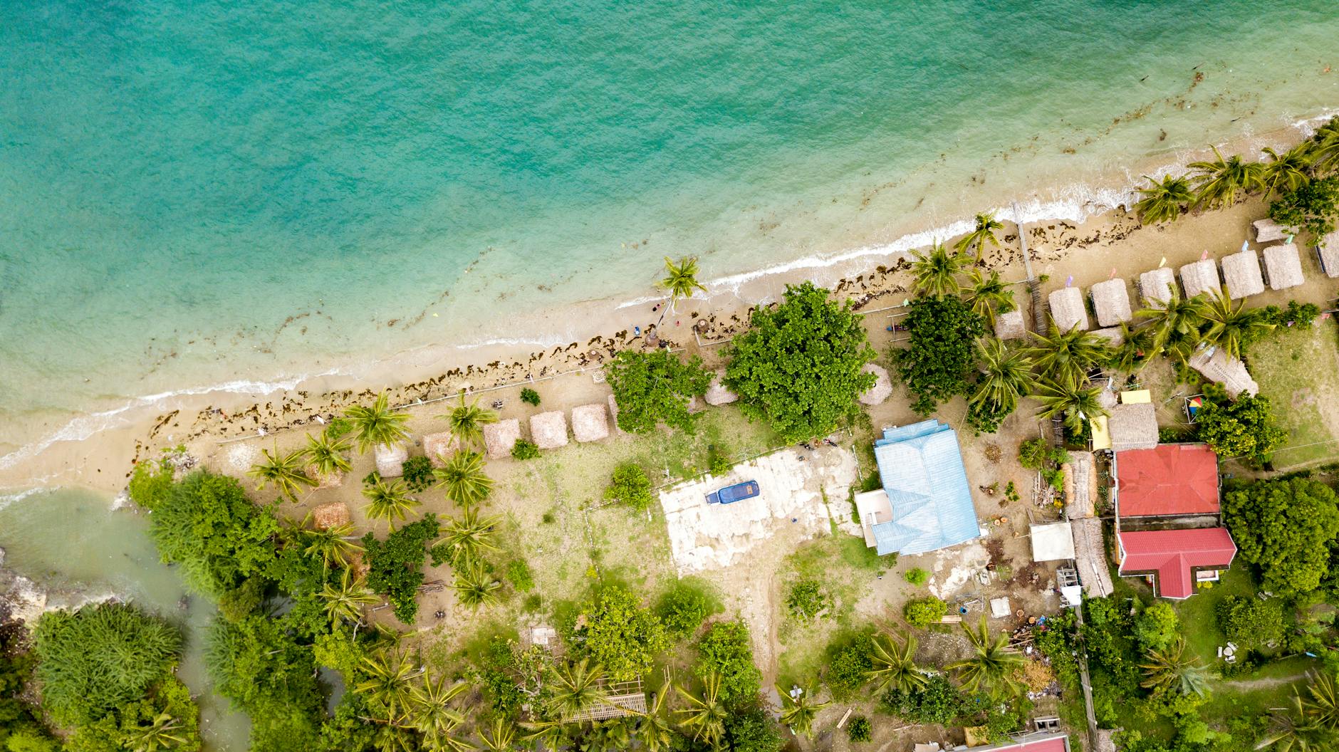 Why Honduras Property Investment Is a Smart Choice for Your Real Estate Portfolio 13 aerial photography a beach resort on a seaside Why Honduras Property Investment Is a Smart Choice for Your Real Estate Portfolio