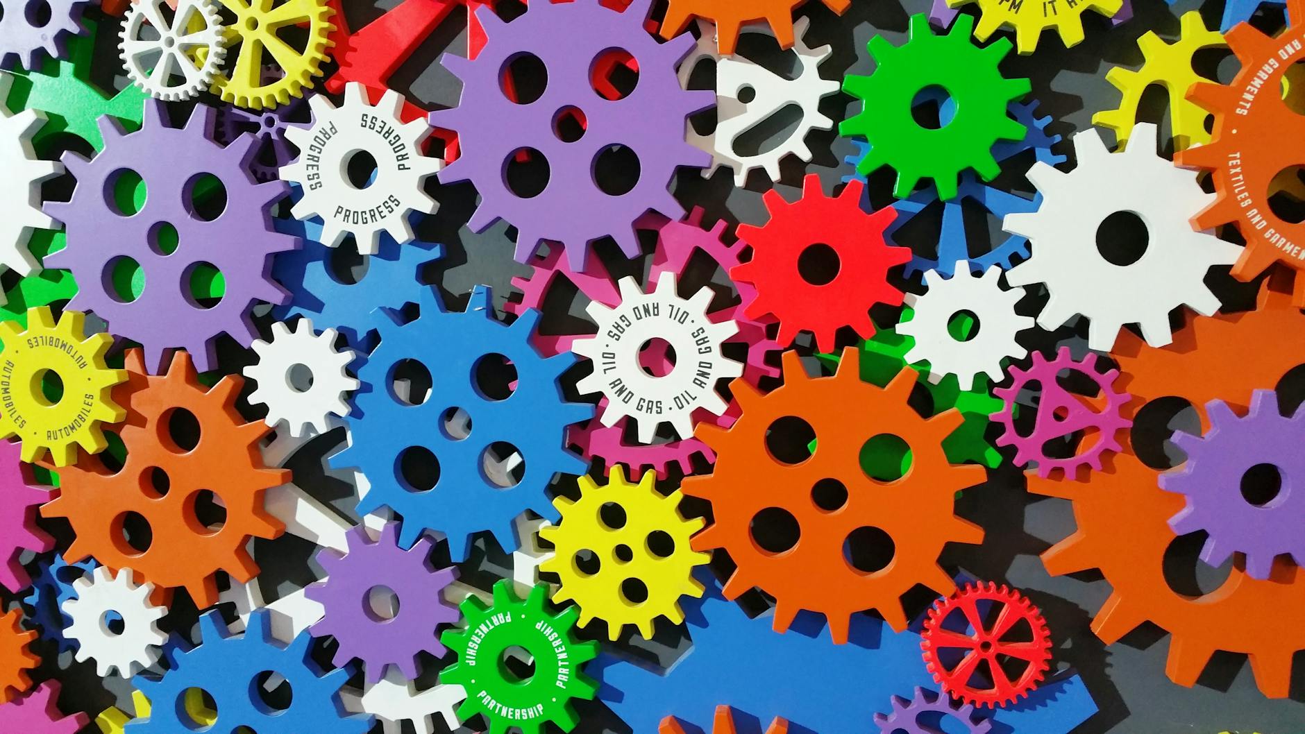 colorful toothed wheels How Smarter Tools Can Streamline Daily Operations for Small Teams