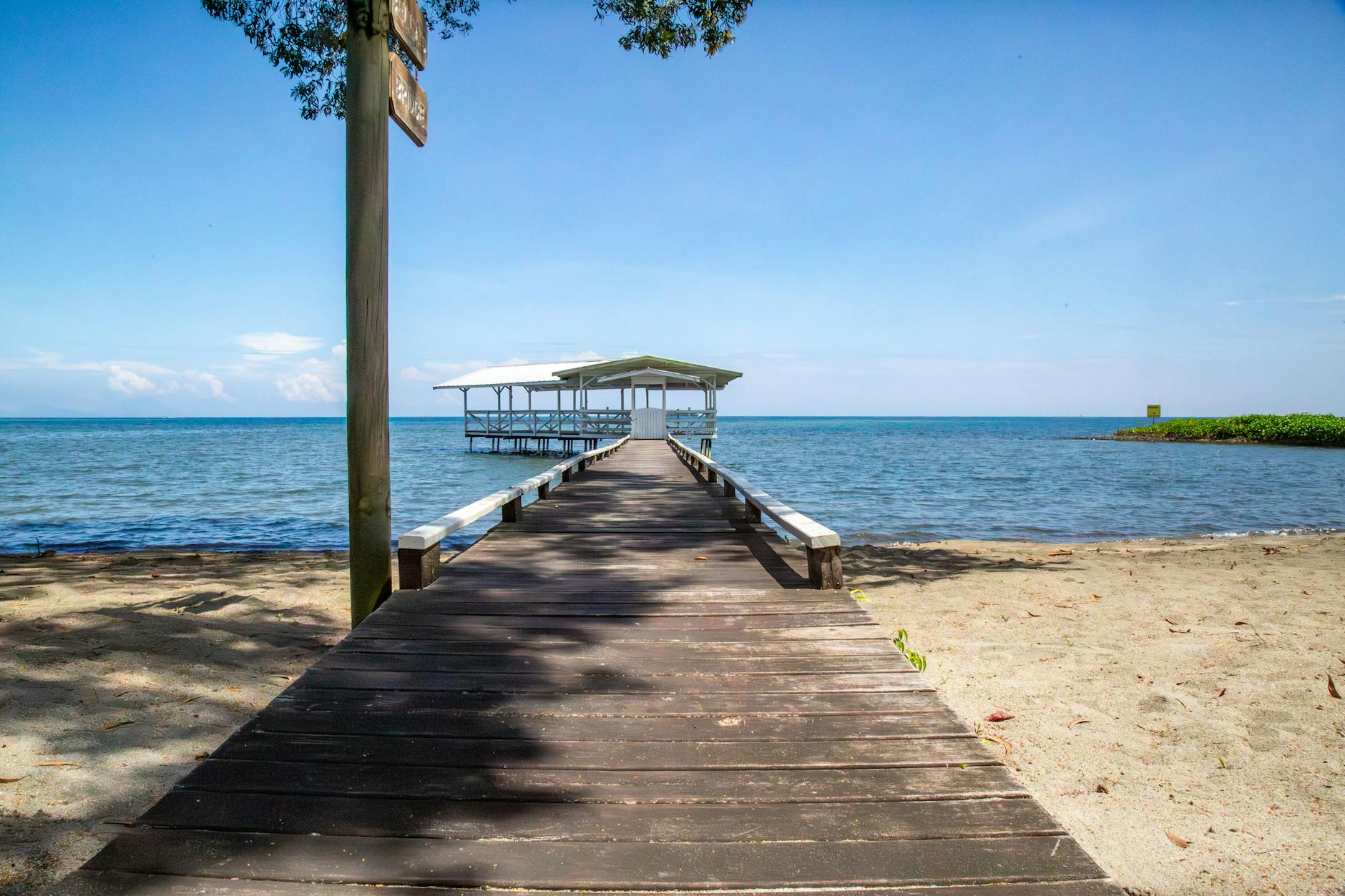 Why Honduras Property Investment Is a Smart Choice for Your Real Estate Portfolio 18 scenic beach pier extending into clear blue ocean
