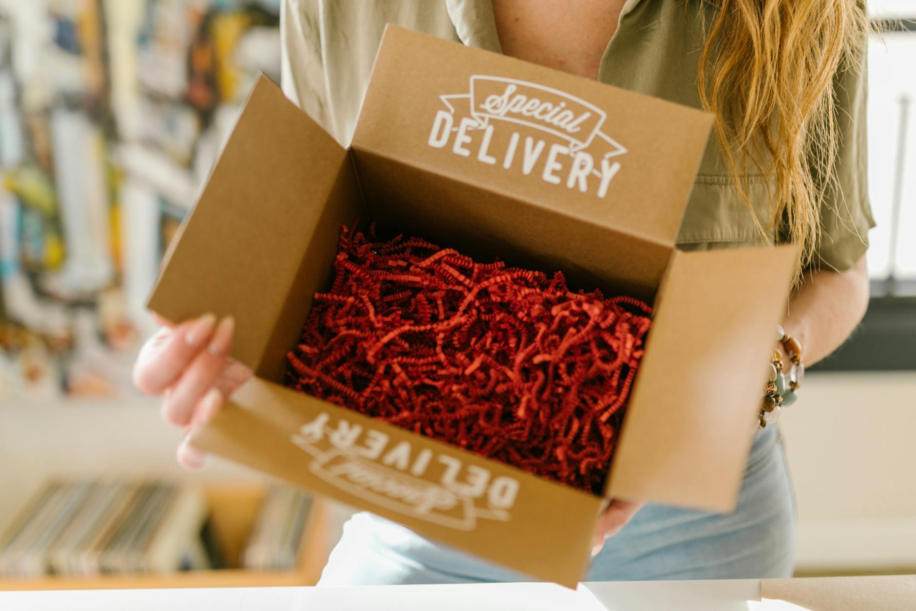a box with red packing fillers The Business Hacks Every Entrepreneur Overlooks