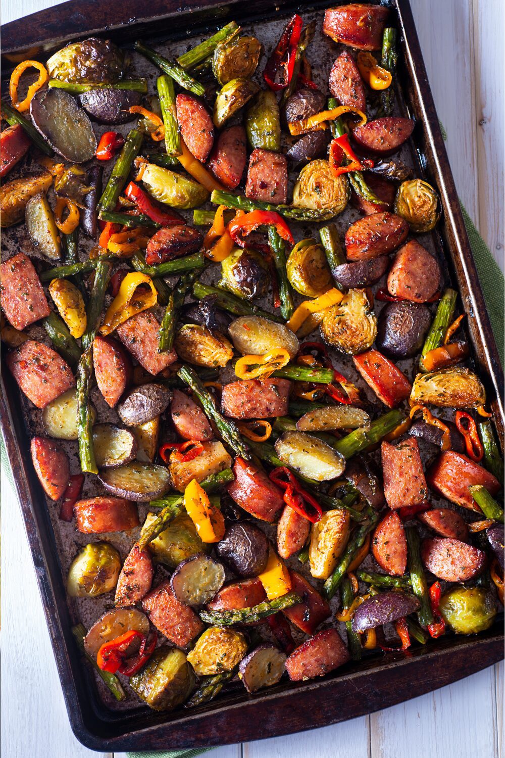 20 Cozy Fall Meals Even the Pickiest Kids Will Devour Maple Glazed Sheet Pan Sausage & Veggies