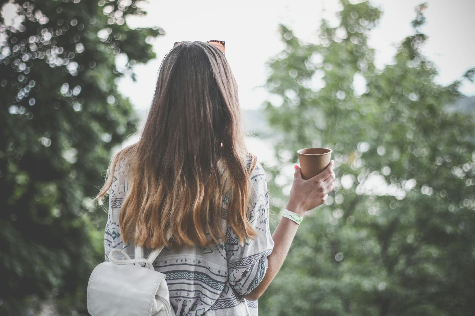 6 Empowering Ways to Reclaim How You Feel About Yourself 11 woman holding brown paper cup 6 Empowering Ways to Reclaim How You Feel About Yourself