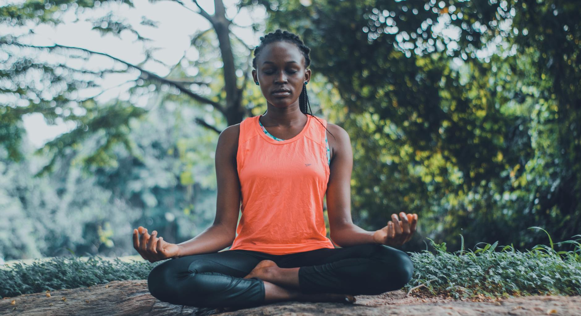woman meditating in the outdoors Rediscover Yourself: 10 Gentle Ways to Reconnect with Who You Are