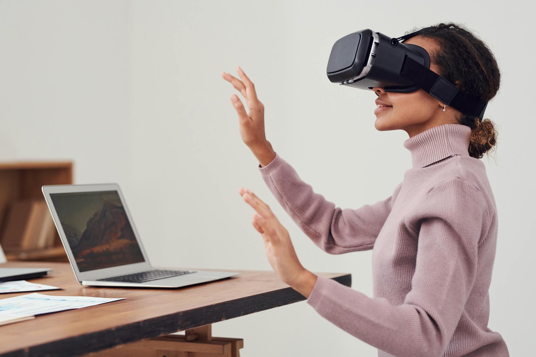 woman using virtual reality goggles The Rise of Practical Smart Gear for Tactical Tech at Home