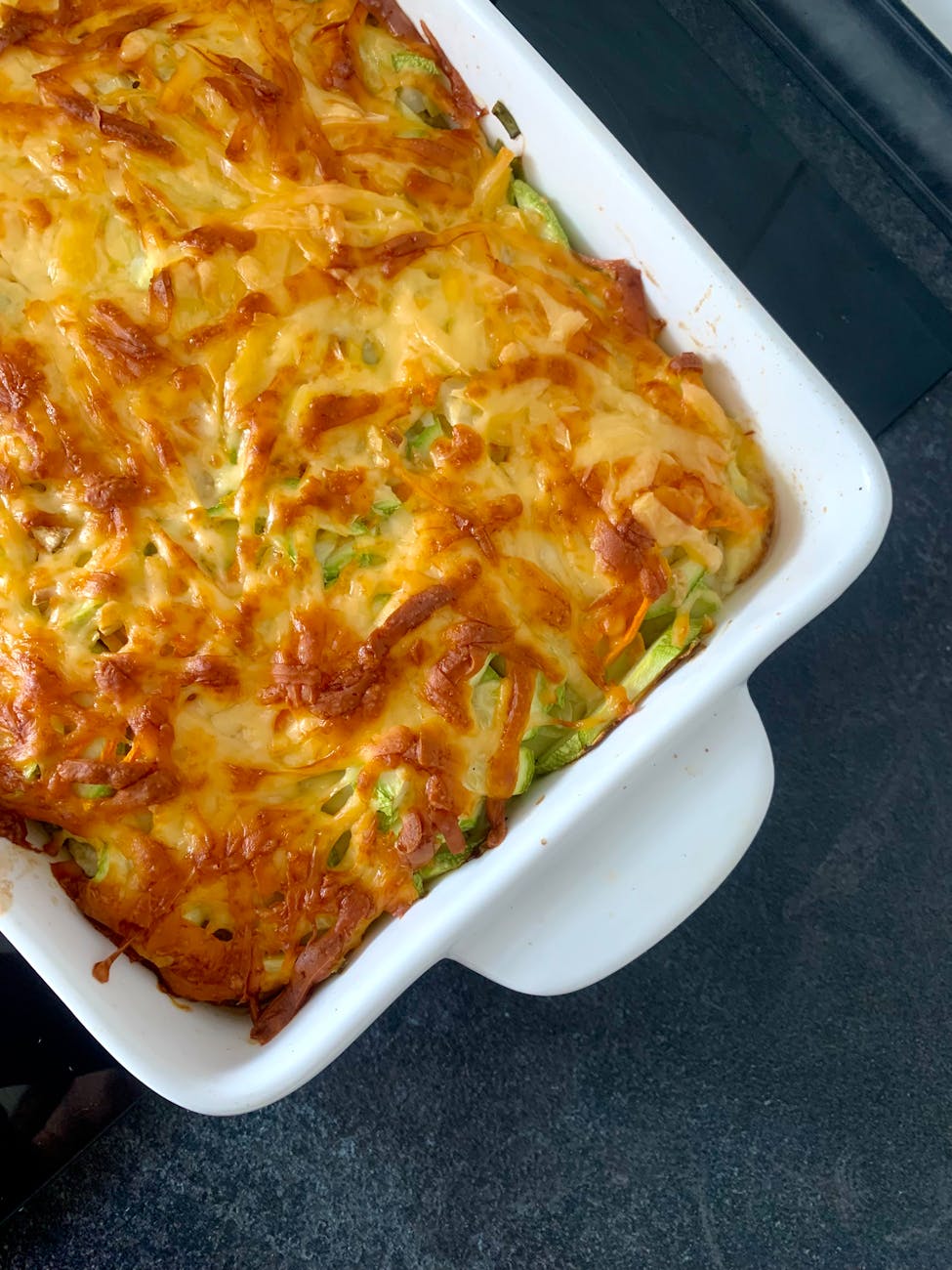 20 Cozy Fall Meals Even the Pickiest Kids Will Devour 8 cheesy baked casserole in white dish 20 Cozy Fall Meals Even the Pickiest Kids Will Devour Cheesy Chicken & Broccoli Bake