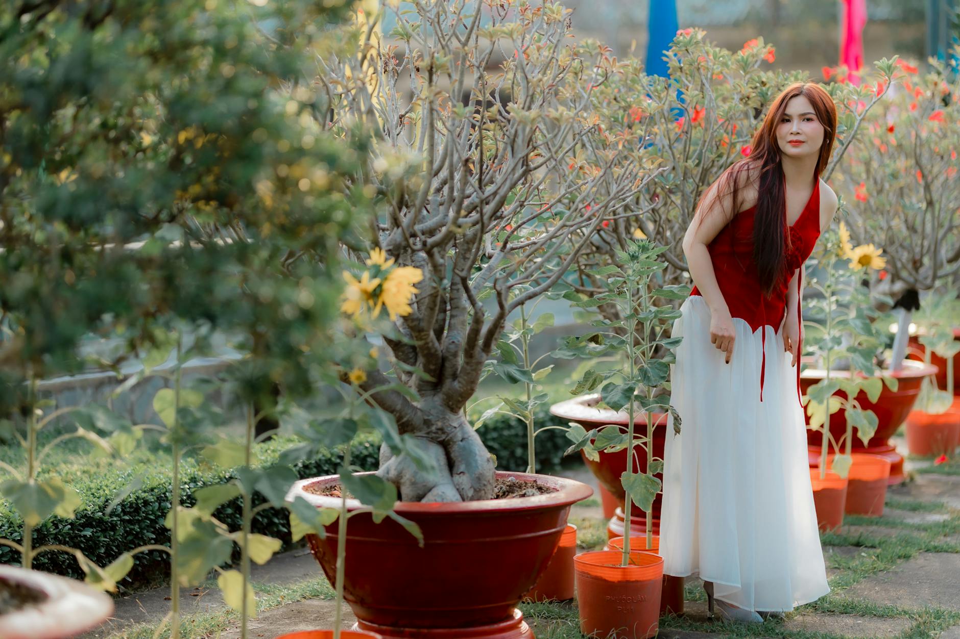 woman in garden with blooming plants Spring Garden Prep Guide: Simple Upgrades with Big Impact