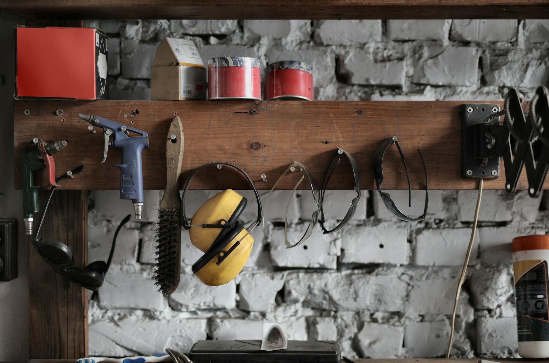 various instruments hanging on wooden board in garage Rural Tech Tools That Make Country Living Easier