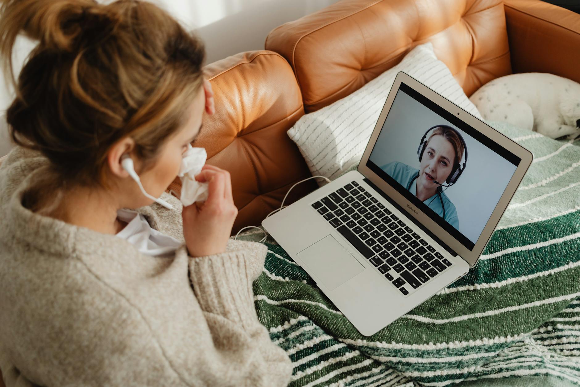 woman looking at the laptop screen Rural Tech Tools That Make Country Living Easier