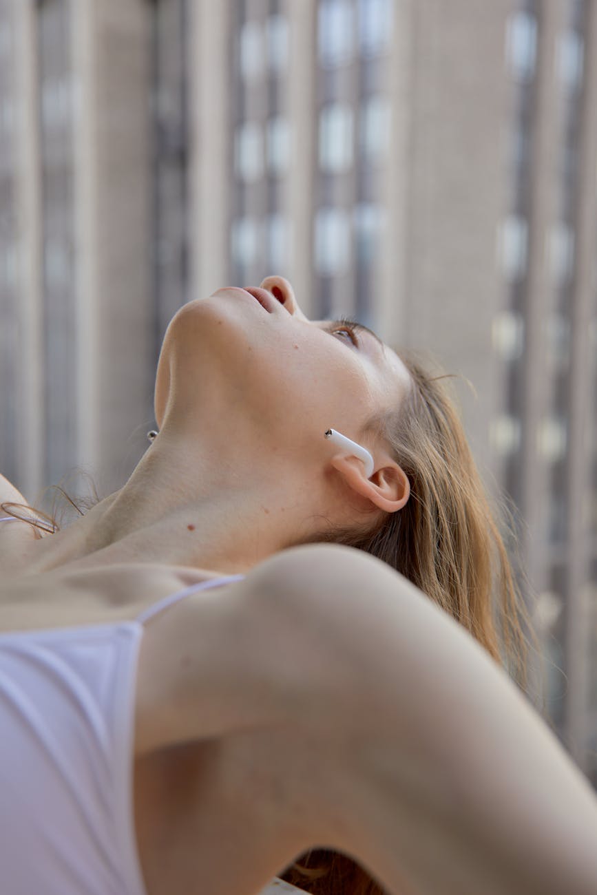 close up photo of a woman bending Living With Tinnitus: How to Cope With Ringing in the Ears