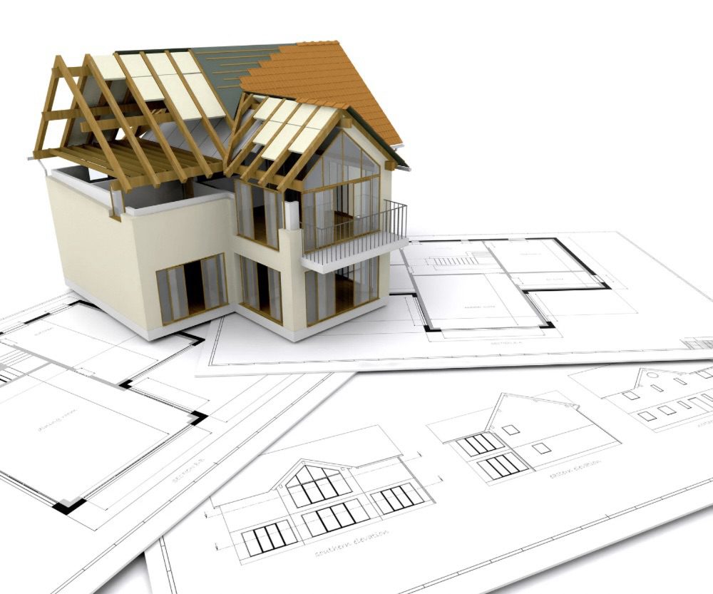Is Building Your Own Home the Ultimate Dream or a Costly Mistake? 8 A 3D model of a house under construction sits atop architectural blueprints, showcasing the design structure and layout for a new home.Is Building Your Own Home the Ultimate Dream or a Costly Mistake?